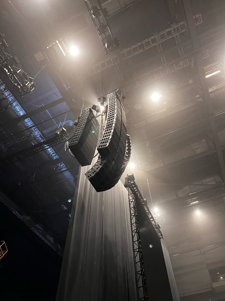 Arena production rigging and line arrays.